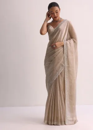 Beige Saree With Cutdana Border And Unstitched Blouse