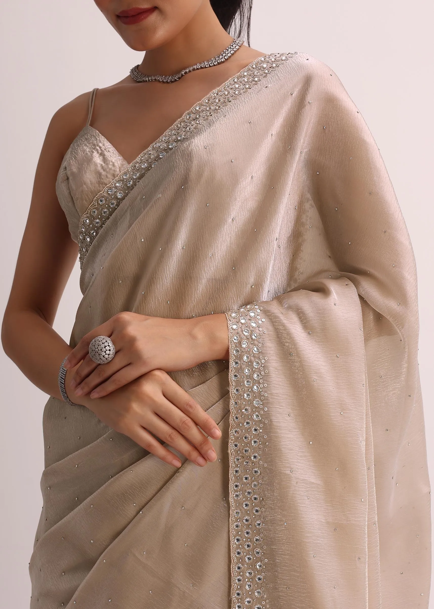 Beige Saree With Cutdana Border And Unstitched Blouse