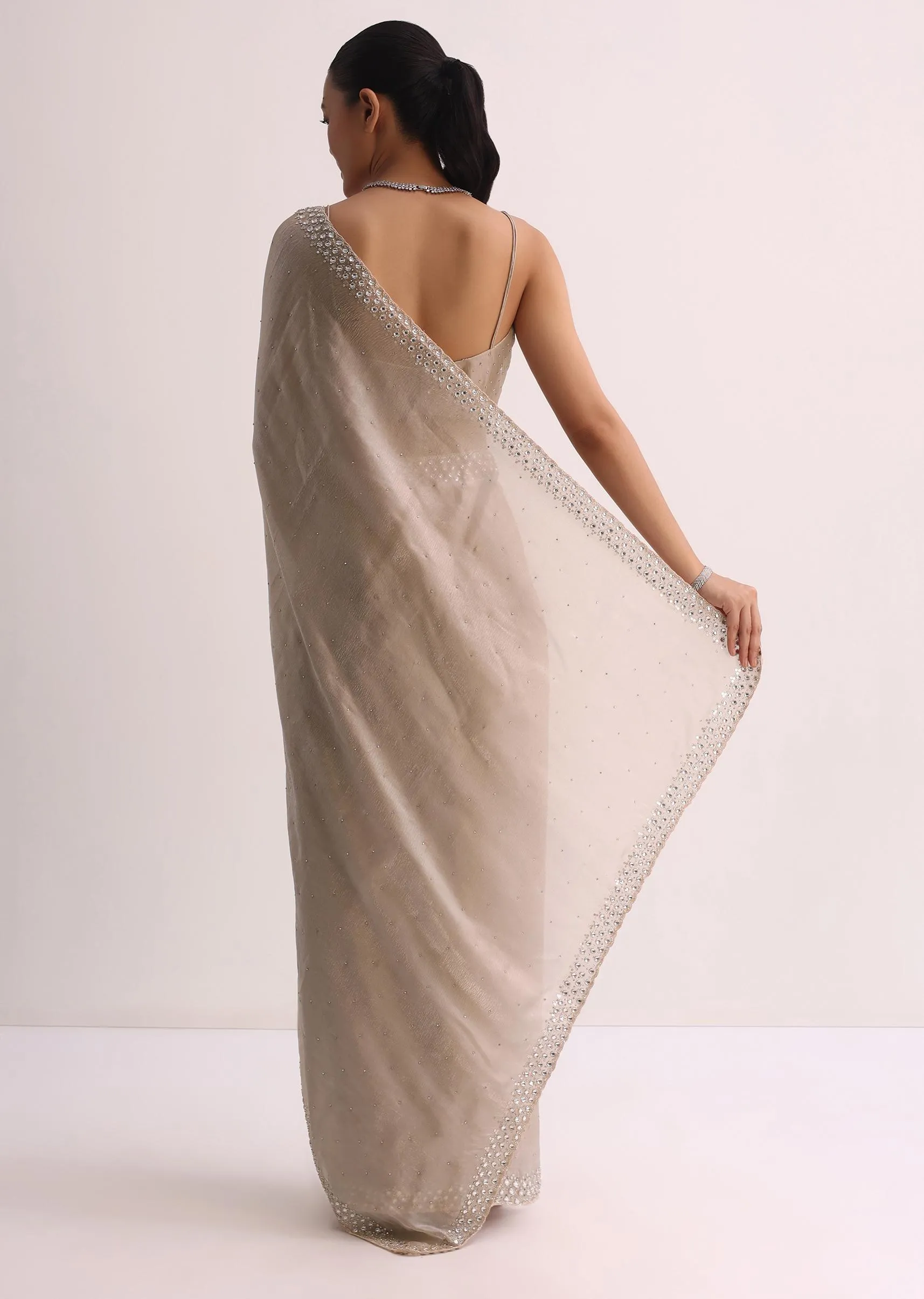 Beige Saree With Cutdana Border And Unstitched Blouse