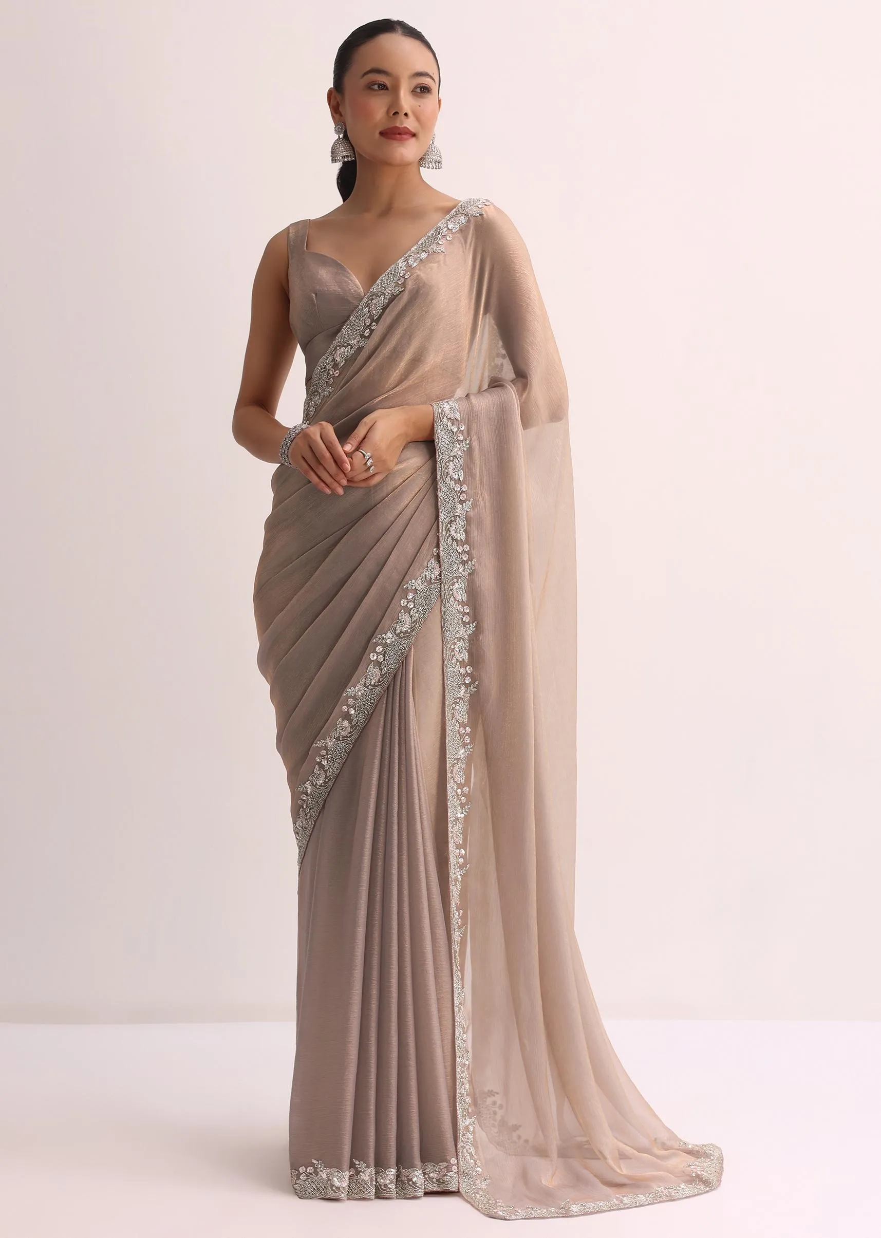 Beige Saree With Embroidered Border And Unstitched Blouse