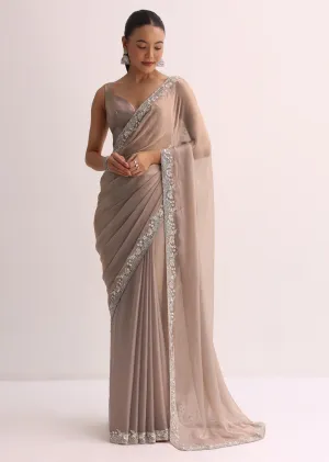 Beige Saree With Embroidered Border And Unstitched Blouse