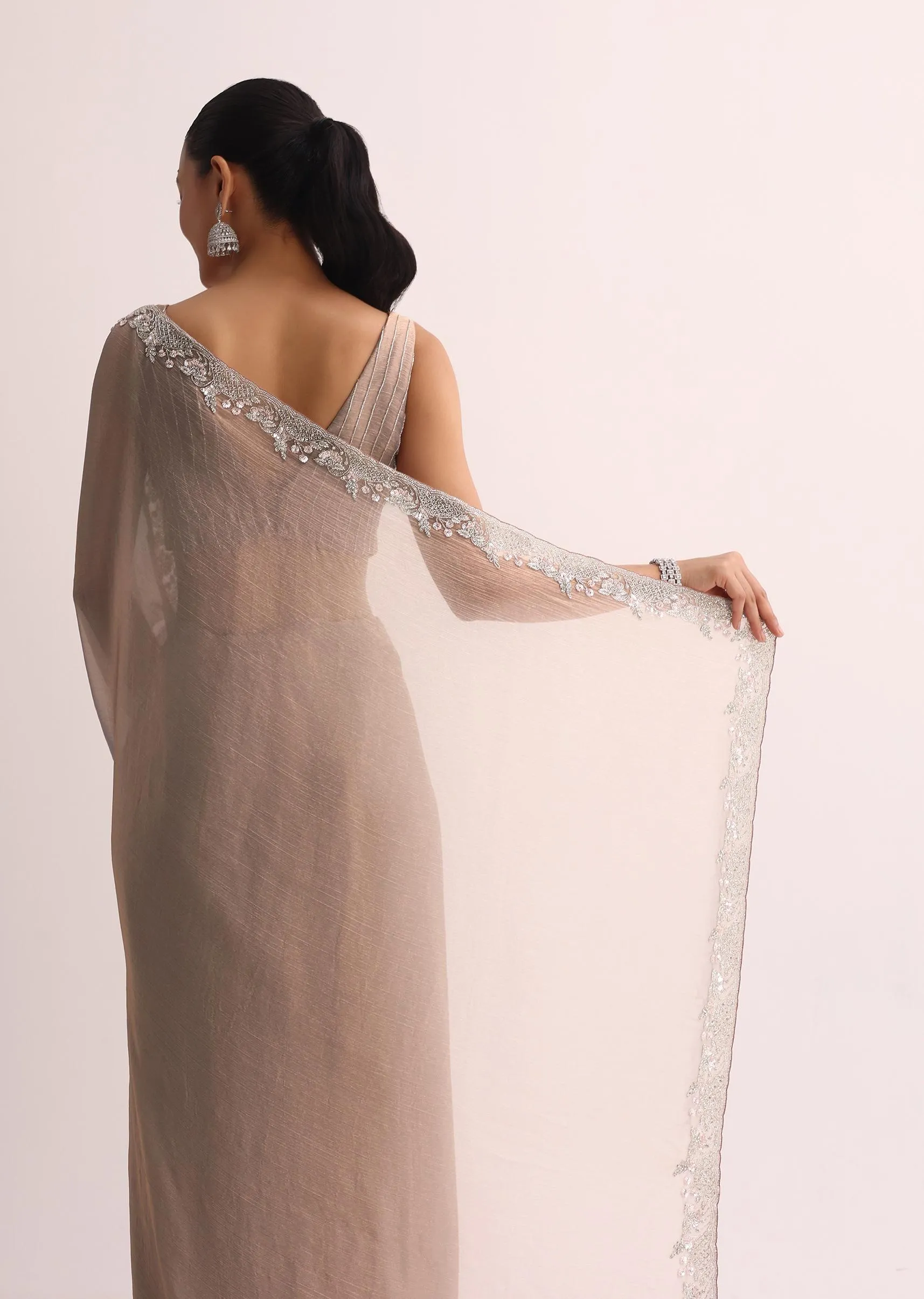 Beige Saree With Embroidered Border And Unstitched Blouse